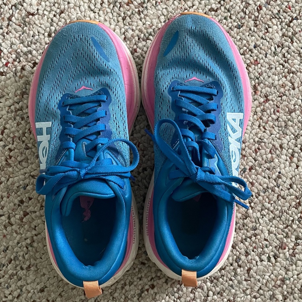 Hoka Blue Running Shoes with Pink and Orange Accents